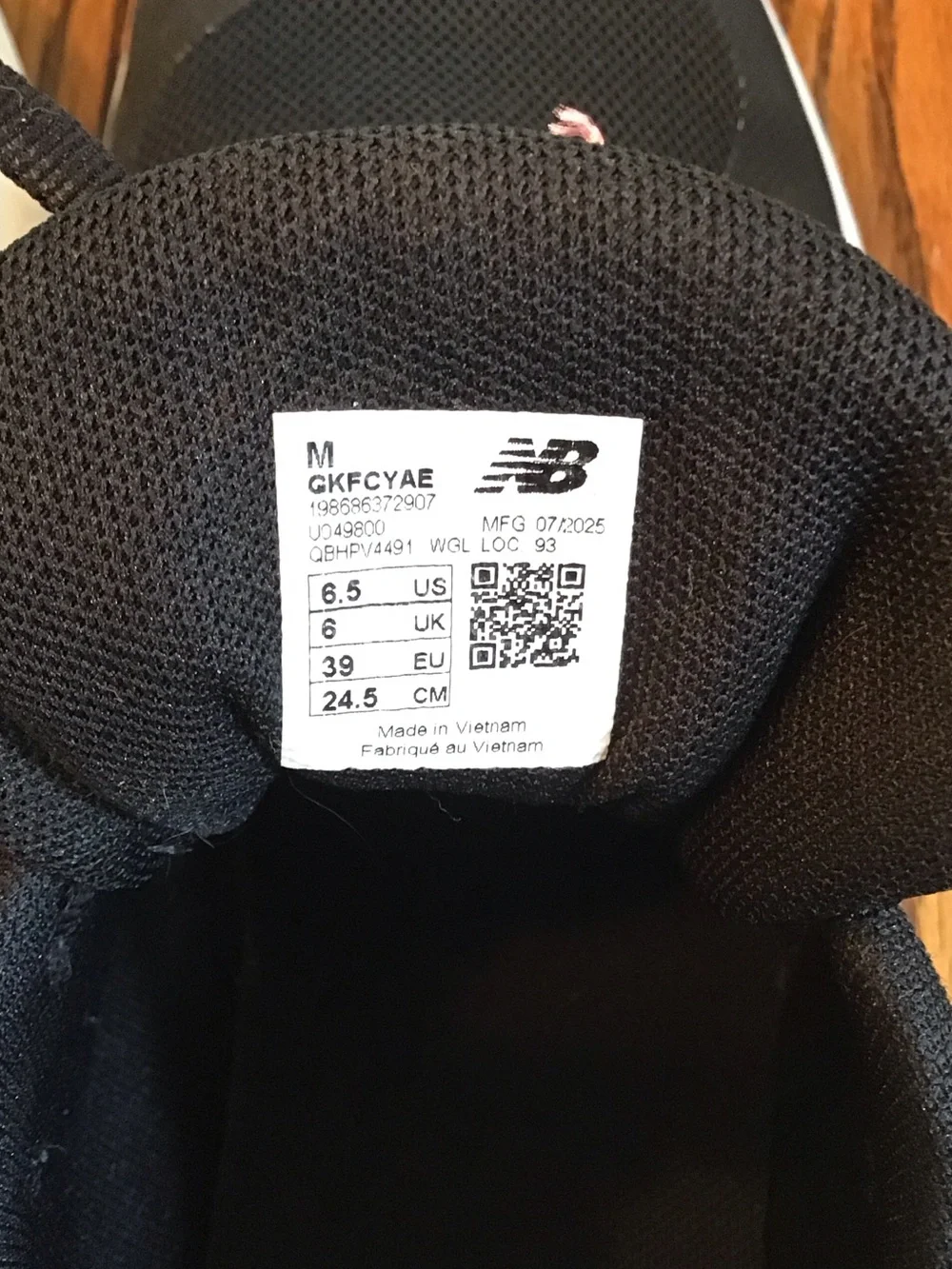 New Balance Women's Black with Pink Athletic Sneakers